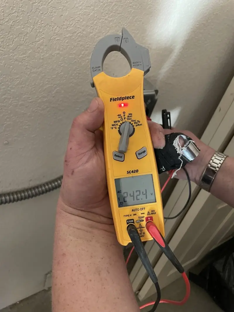 Voltage testing with clamp meter during Circuit Breaker Repair in Bloomingdale
